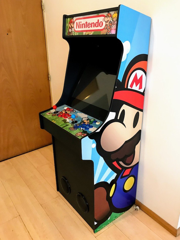 Vinyl and pinball buttons installed on the cabinet