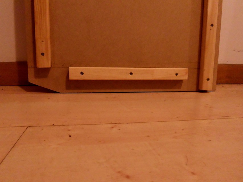 Pine strips attached to the bottom board