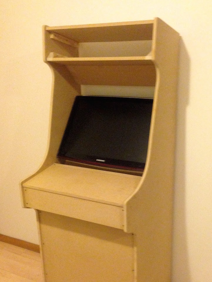 A monitor installed on the wooden cabinet