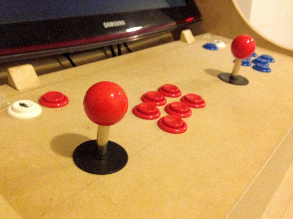 All 18 buttons installed. Half of them are red, the other half are blue