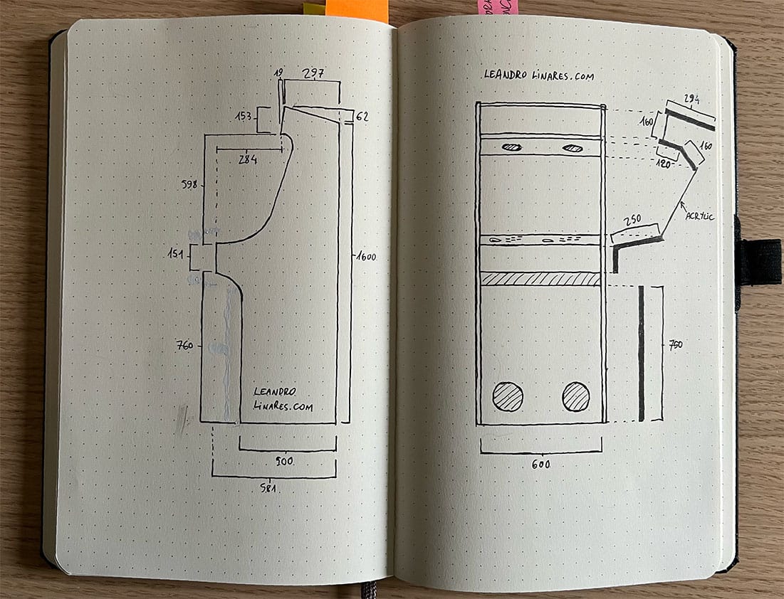 A notebook with the hand drawn plans
