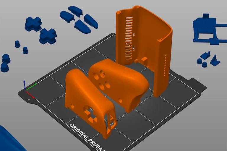 Three 3D printed pieces of the case assembly
