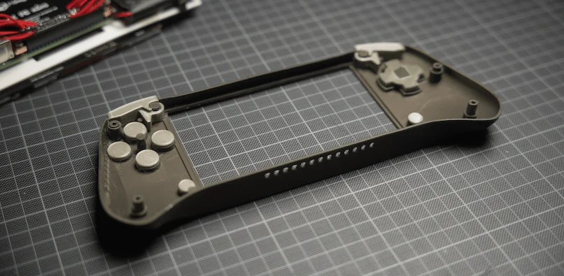 Inserting the 3D printed buttons into the front case