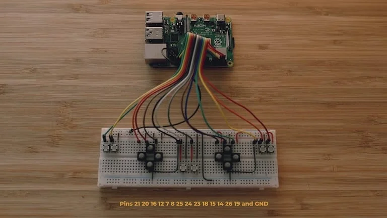 Breadboard with buttons wired directly to Raspberry Pi GPIO pins
