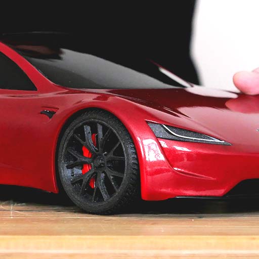 A scale model of a Tesla Roadster